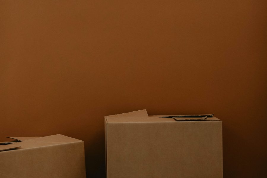 white cardboard box on brown wooden table